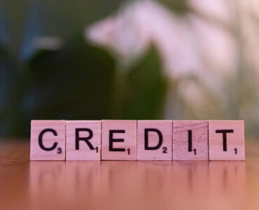 Block letters spelling credit